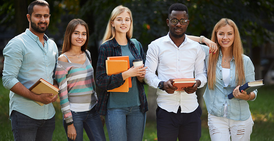 ftl-group-with-books Group of young adults with books, making progress