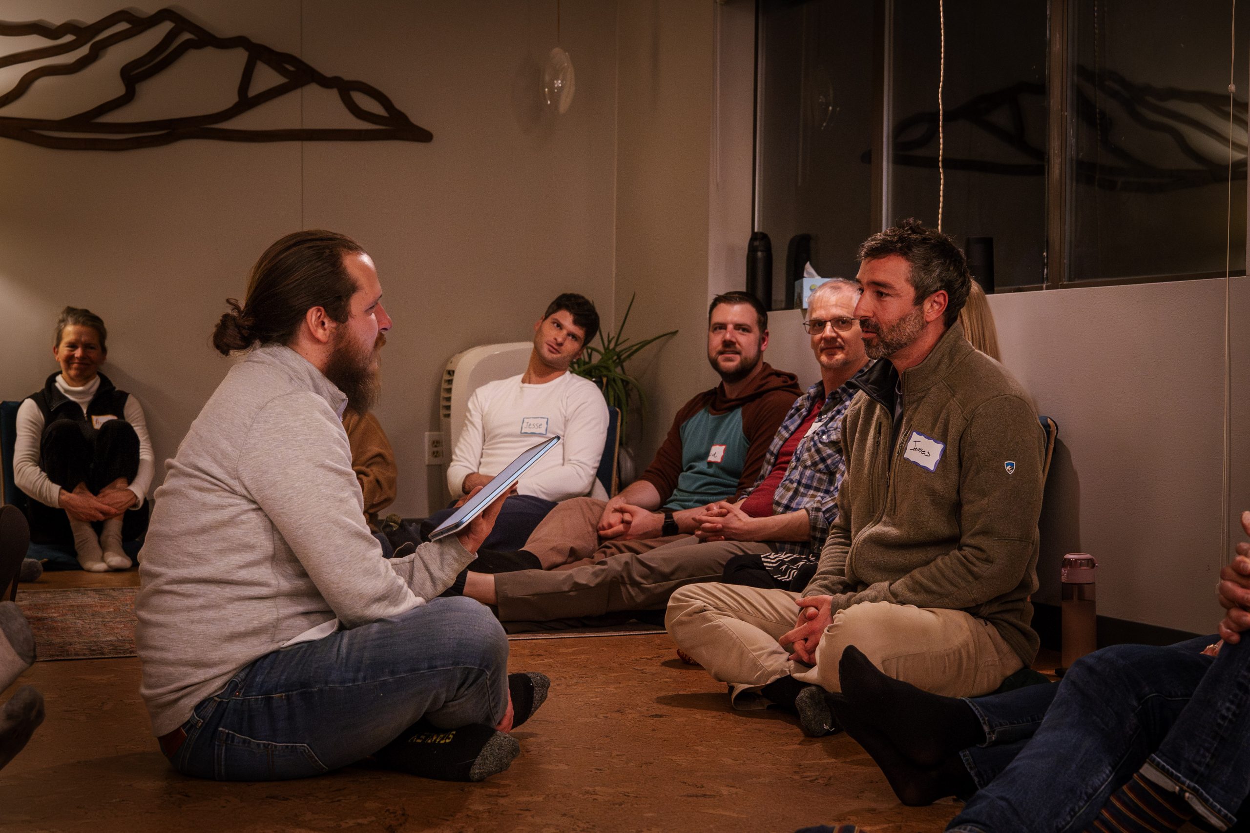 34-CW_04746 A facilitator guiding a group session at the Colorado Connection Collective